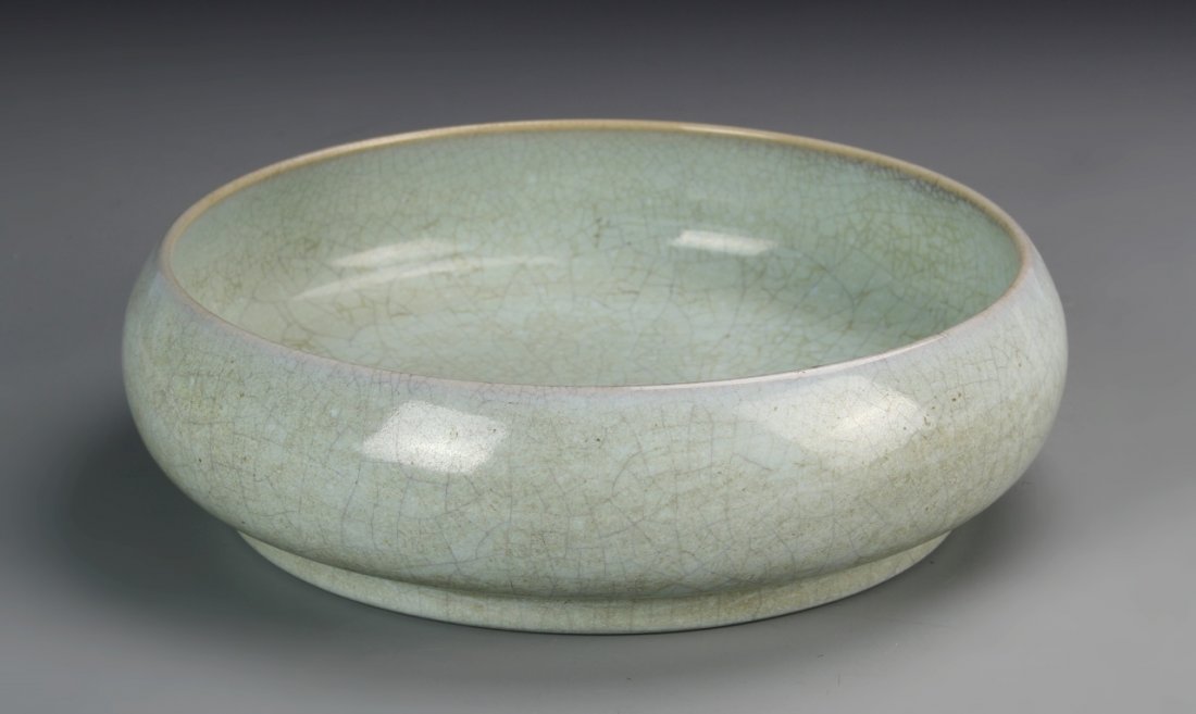 Chinese Antique Celadon Brush Washer: China, antique celadon glazed brush washer, in rounded form with slight crackling in glaze, with footed base. Diameter 9 1/2 in., Height 2 3/4 in.