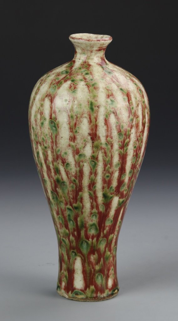 Chinese Peach Blossom Meiping Vase: China, 19th C., peach blossom Meiping vase, thin base with bulbous shoulder, slightly flouted with hues of green, and red, natural striation in porcelain visible. Height 8 in.