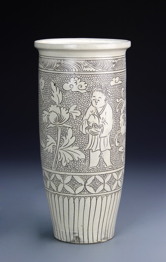 Chinese Cizhou Ware Vase: China, Cizhou ware vase in a cylinder form, decorated with figures and floral motifs. Height 11 1/2 in., Diameter 5 3/8 in.