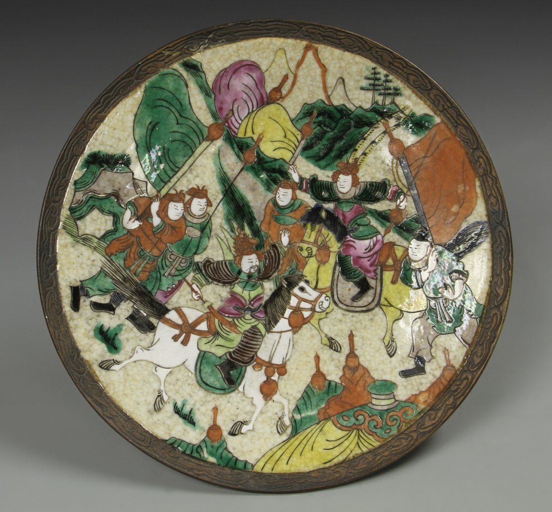 Chinese Export Plate: China, 19th C., export plate, with colorful scenes of warriors in a landscape, some on horses, and holding spears, minor repair. Diameter 17 7/8 in.
