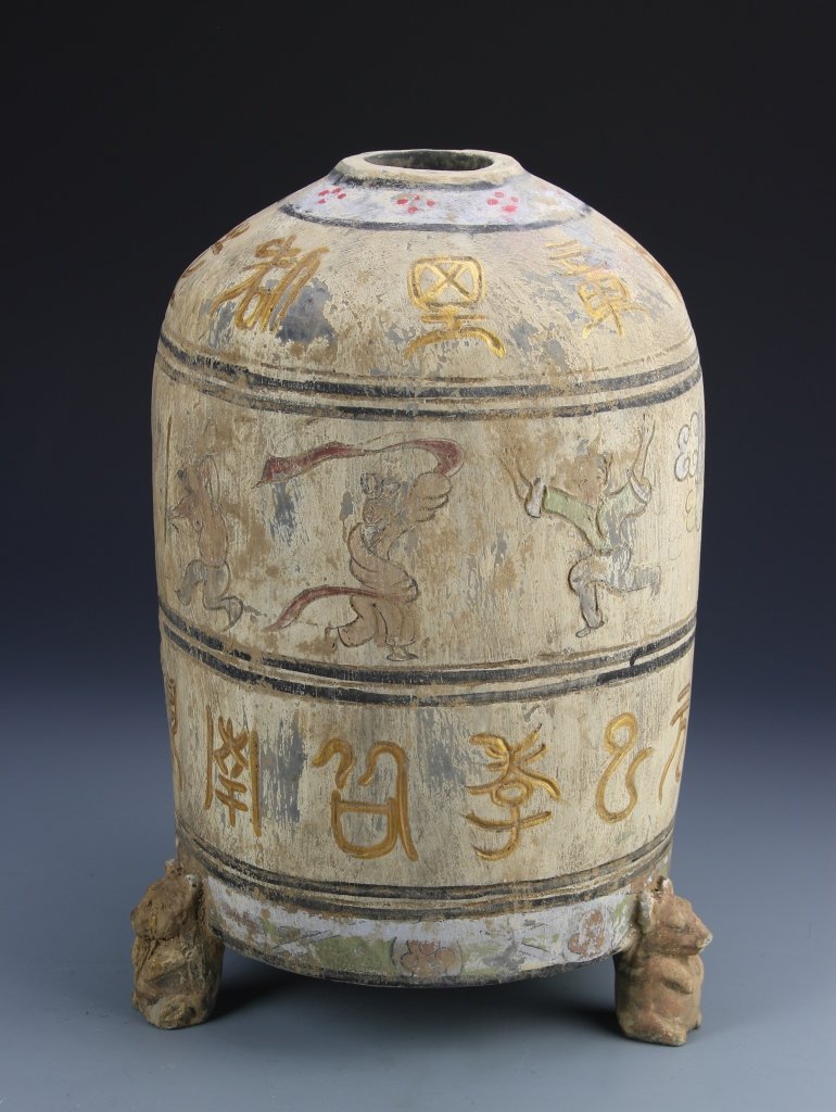 Chinese Painted Jar: China, Han Dynasty, painted jar with tripod animal feet, decorated with colorful paintings of calligraphy characters and figures engaged in various activities. Height 14 1/2 in.
