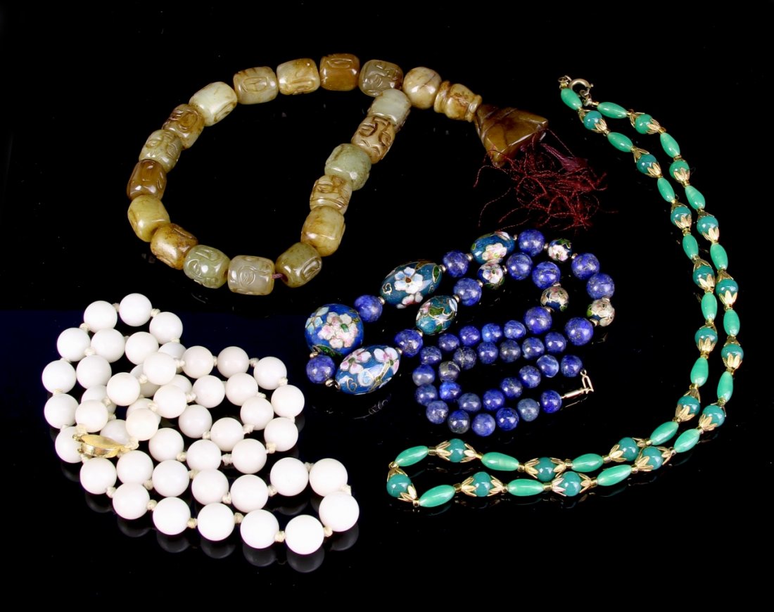 Group Of Chinese Jewelry Pieces: China, a group of four jewelry pieces, the first small circular white beads with gold clasp, the second brightly painted with floral motif on blue ground and increasing bead size, the third short fat 