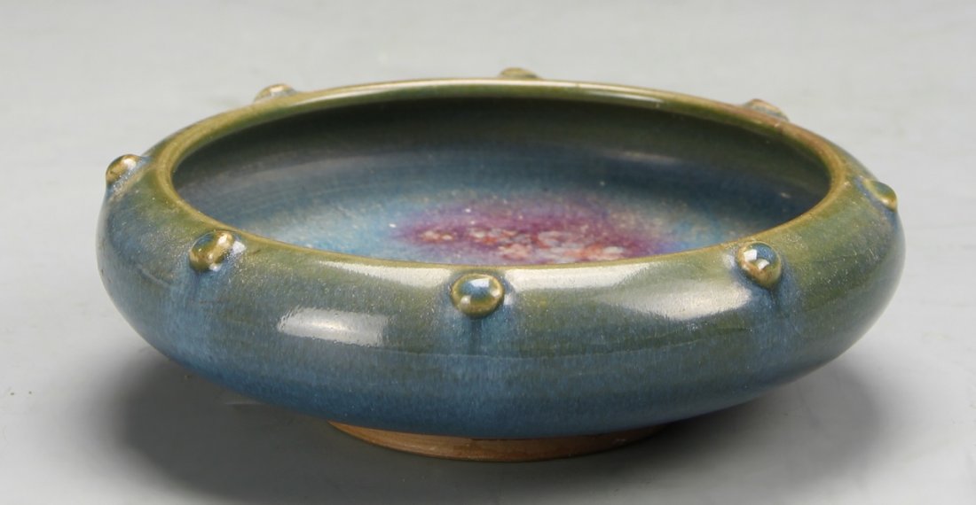 Chinese Jun Ware Brush Washer: China, 19th C., Jun ware brush washer, in a lovely mottled glaze, with beaded decorations placed intermittently around the rim. Height 5 in. Width 1 1/2 in.