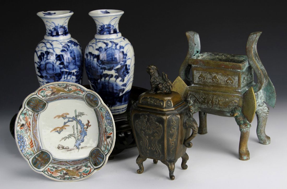 Five Piece Chinese Collection: China, 19th C., five items; a pair of blue and white vases, Famille Rose bowl, and two bronze censers with cast decoration. Largest: Height 8 in.