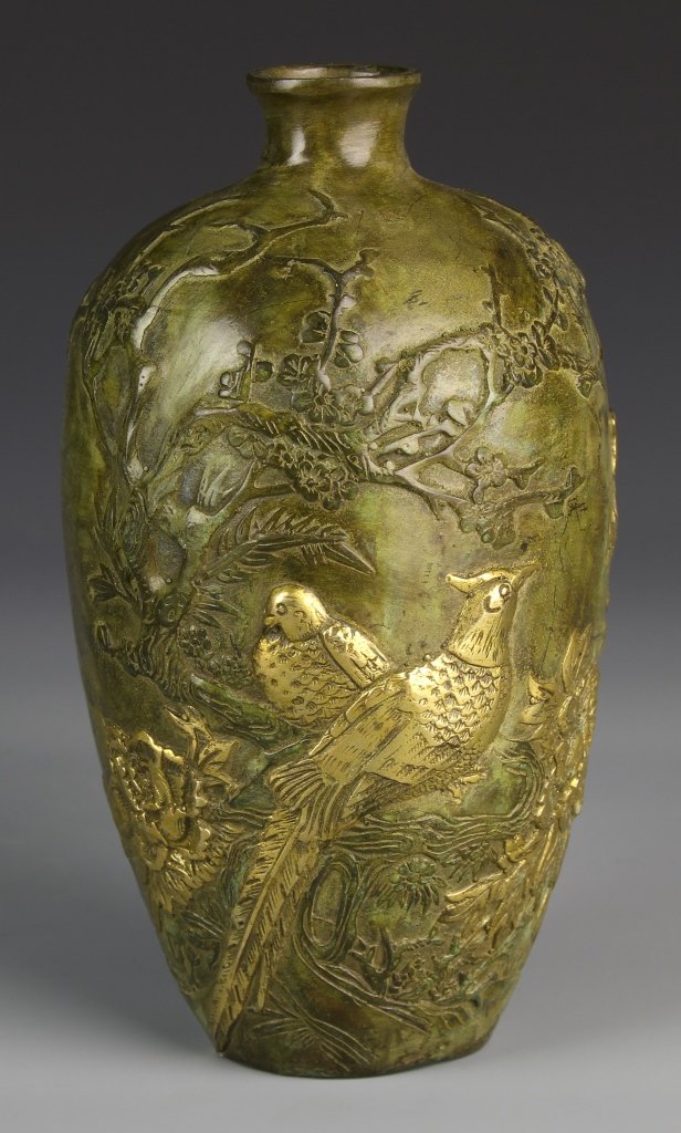 Chinese Bronze Vase: China, 19th C., bronze vase, with broad shoulders and short neck tapering down to the base, decorated with a guilt pheasant in a natural landscape, mark on base. Height 8 in.