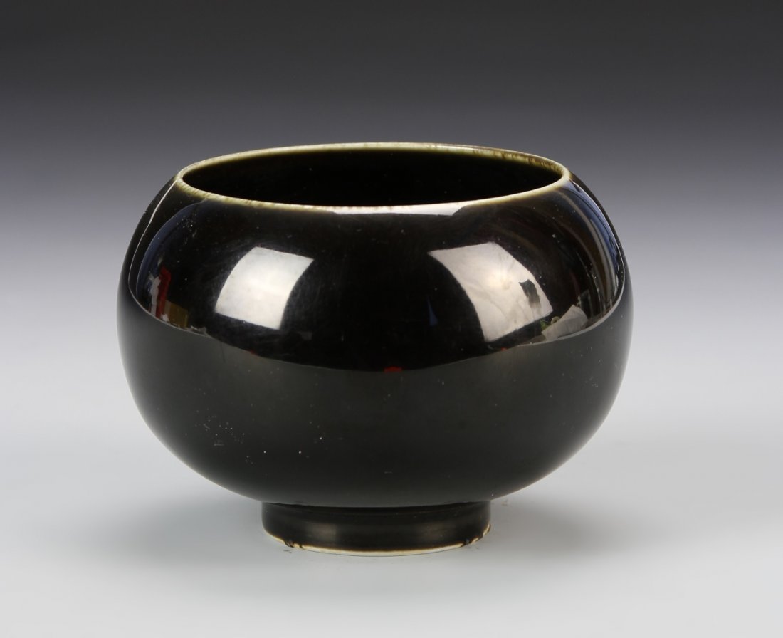 Chinese Ming Period Brush Washer: China, Ming Period, black glazed brush washer in rounded form with a strong footed base, with a thin band of light coloring along rim, mark on base. Height 2 3/4 in.