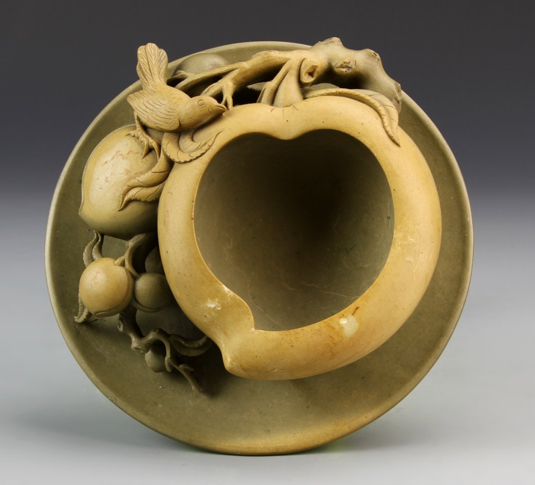 Chinese Ink Stone Carved Brush Washer: China, ink stone carved brush washer, with a large center beach forming the bowl of the washer, surrounded by smaller peaches on a vine. Diameter 6 1/2 in.
