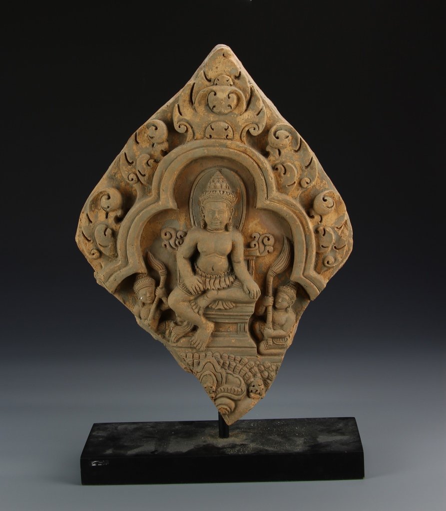 Southeast Asian Antique Tile Buddha on Stand: Southeast Asia, antique tile Buddha on stand, Buddha figure in center encircled by design border, two characters on both sides, fragment from larger piece. Height 16 1/2 in.