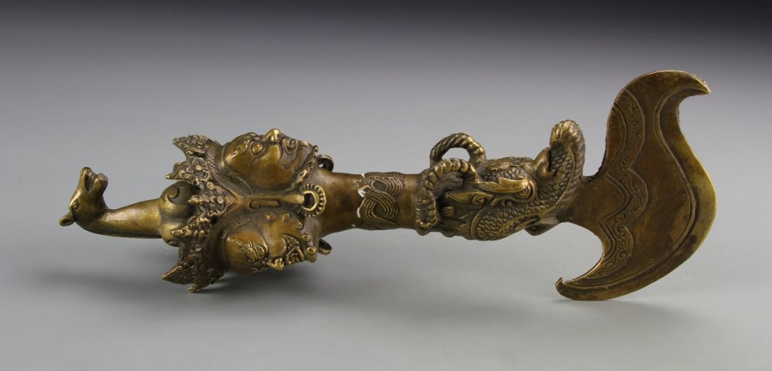 Chinese Tibetan Brass Buddhist Tool: China, Tibetan brass Buddhist tool. Height 11 in.