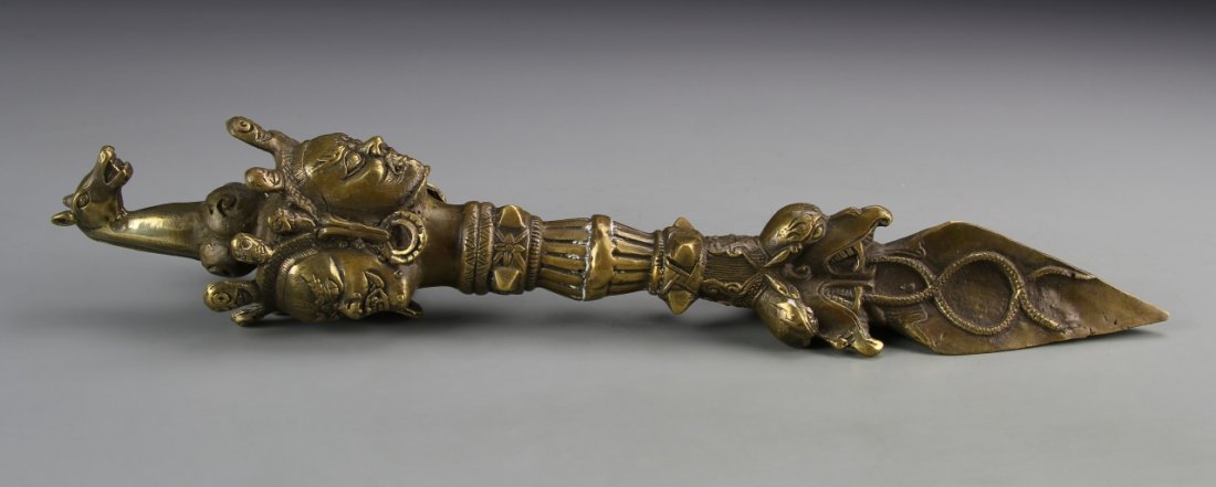 Chinese Tibetan Brass Buddhist Tool: China, Tibetan brass Buddhist tool. Height 14 in.