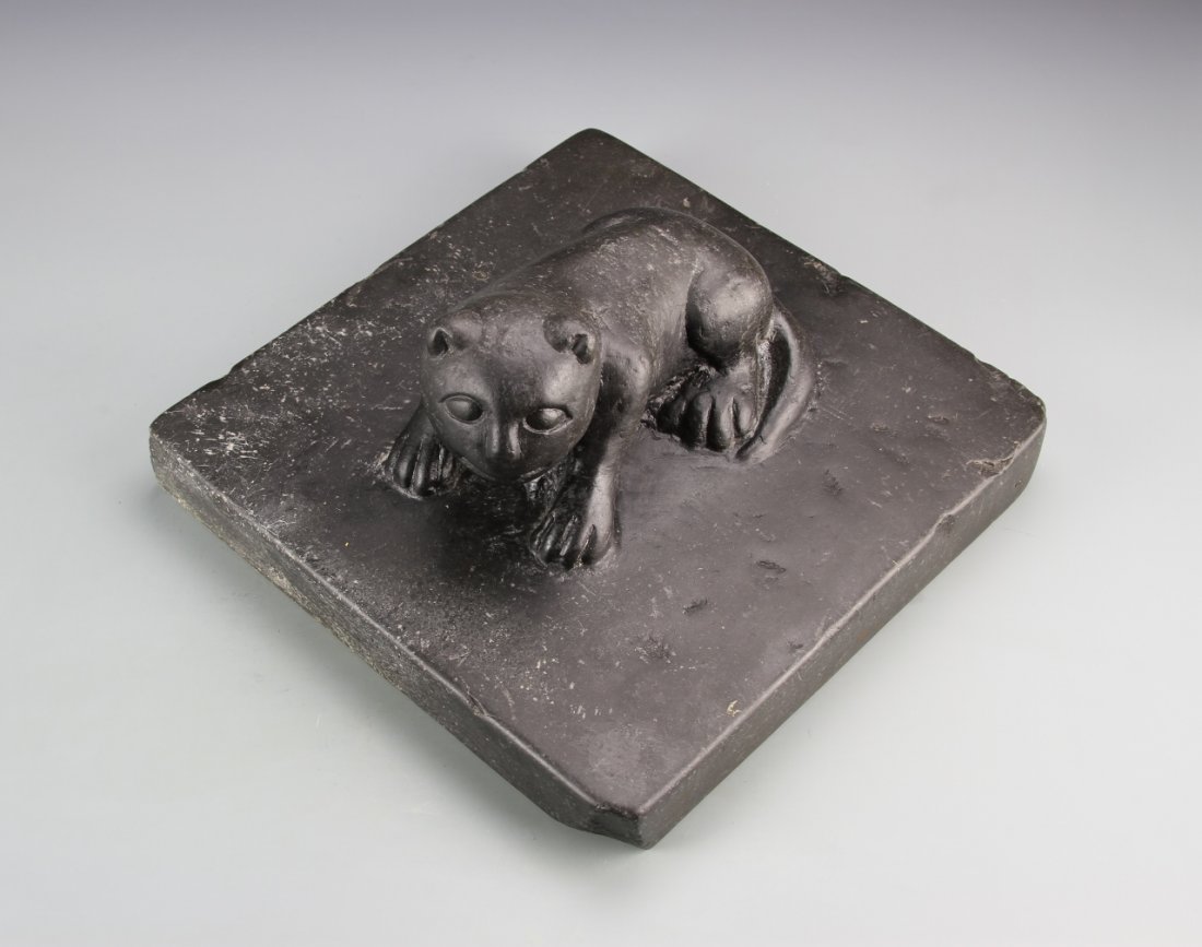 Chinese Antique Limestone Beast: China, antique limestone beast, carved cat like animal with humanistic facial features, on a square, smoothly carved base. Dimensions 10 in., 10 in.