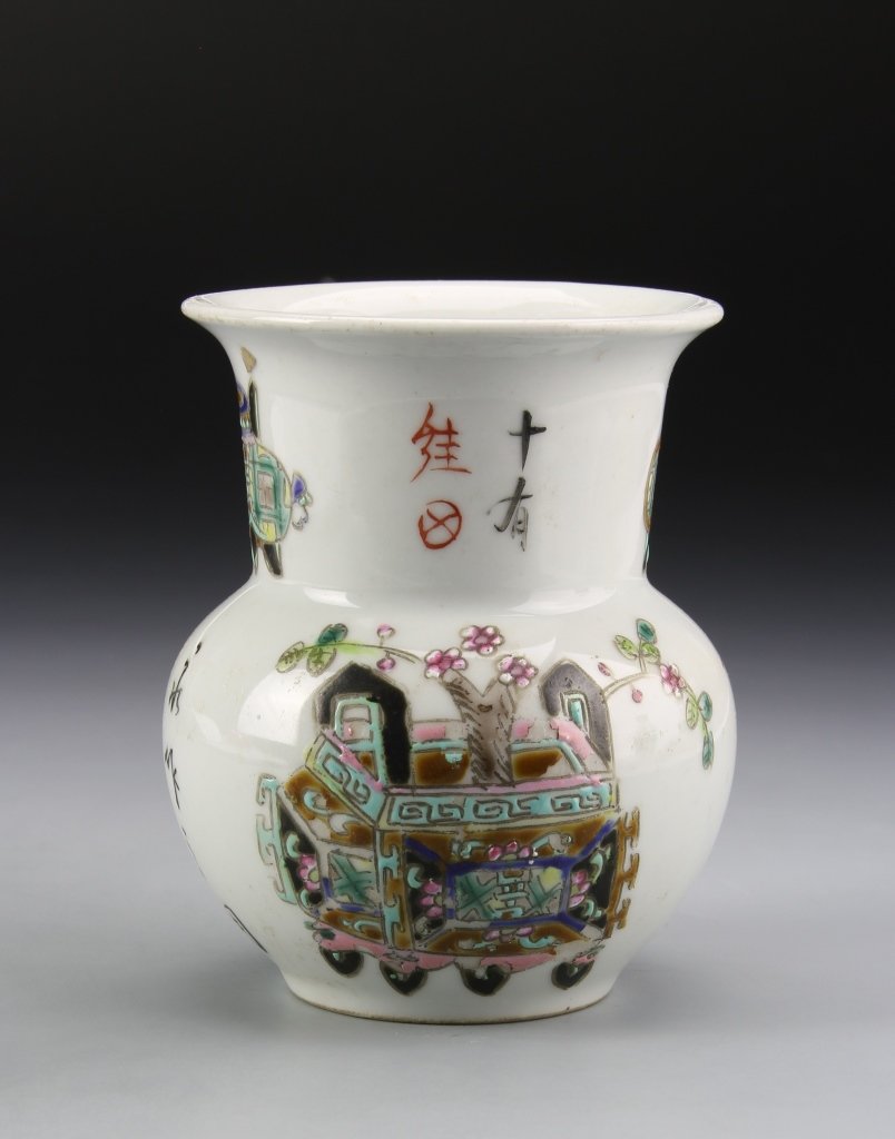 Chinese Famille Rose Vase: China, 19th C., Famille Rose vase, with bulbous body, tapered neck, flared rim, and colorful landscape motifs, mark on base. Height 3 1/8 in.