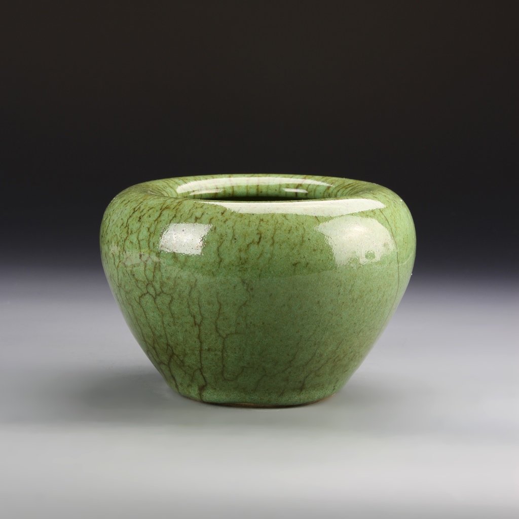 Chinese Apple-Green Glazed Brush Washer: China, 19th C., apple-green glazed brush washer, squat body with rounded shoulders and a inward turned lip, forest green glaze with darker speckles. Height 4 3/4 in., Width 7 in.