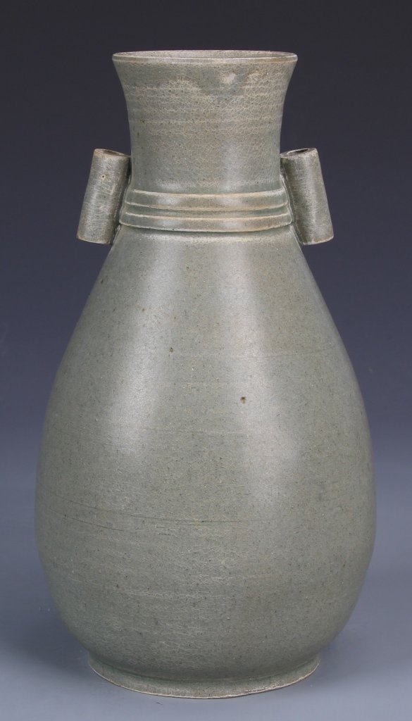 Chinese Lungquan Ware Vase: China, Lungquan ware vase, with bulbous body, two cylindrical ears, and double ring detail around the neck, short foot. Height 7 3/4 in.