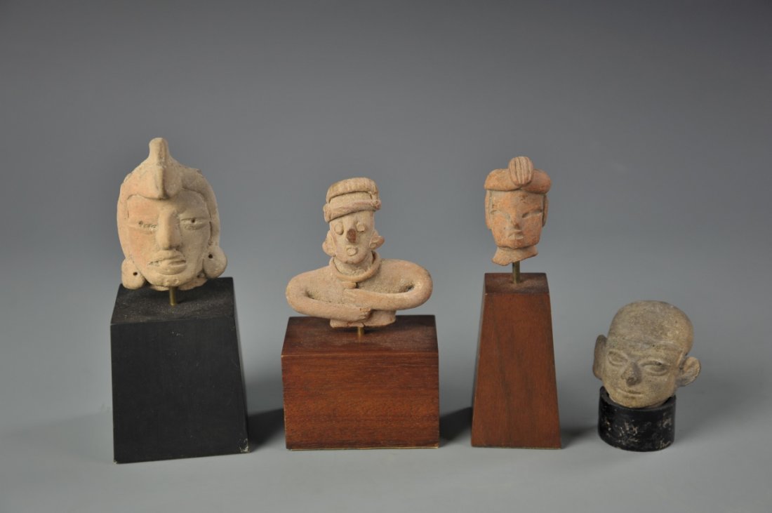 Four Pre-Colombian Heads: Four pre-Colombian heads, including three Calima. 5/12 in.