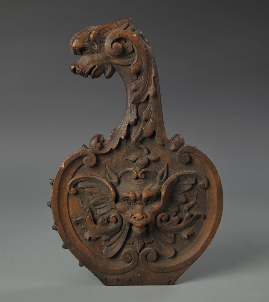 Carved Wood Bellows Fragment with Mythical Figures: Carved wood bellows fragment with mythical figures. 11 in., 7 in.