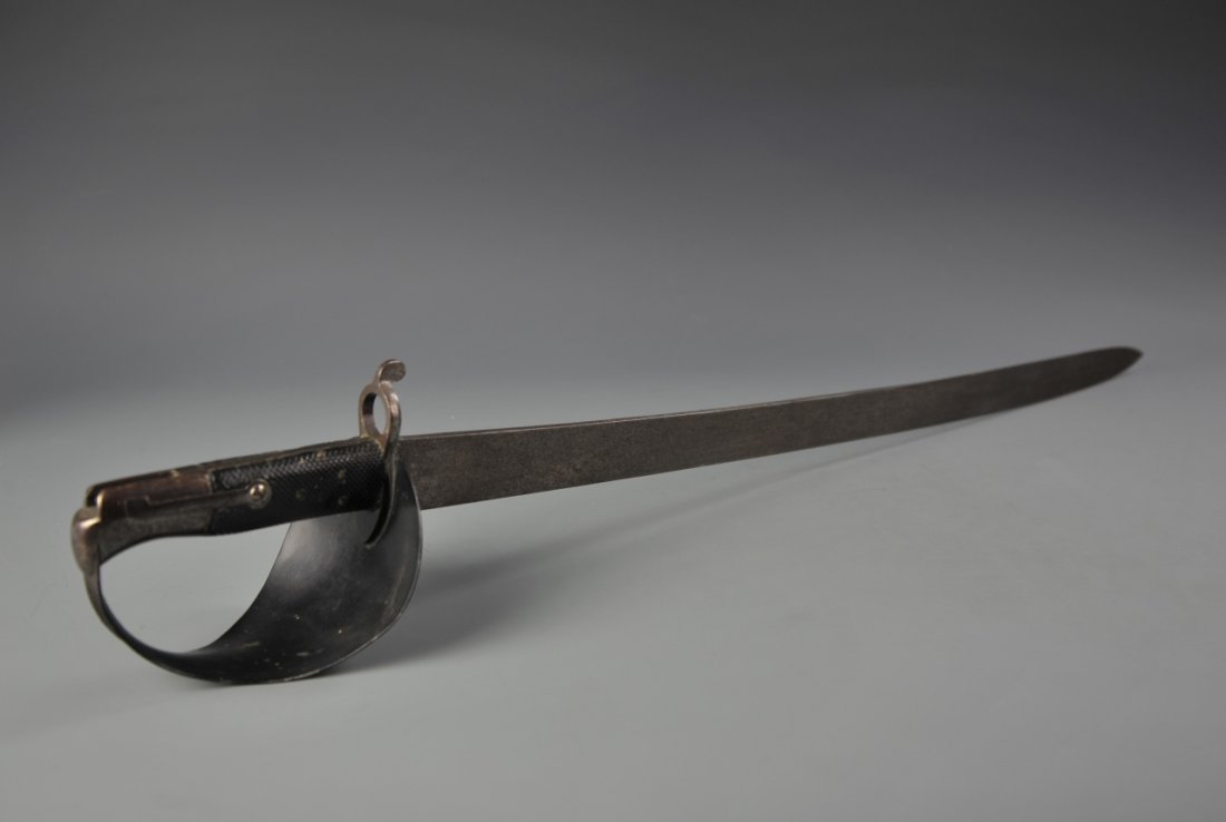 C.S.N Boarding Cutlass/ Bayonet: Western, Civil War era, C.S.N. Boarding Cutlass/ Bayonet, with illegible mark. Measurement 32 1/2 in.