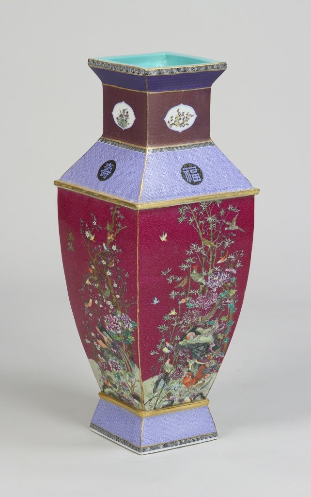 Chinese Famille Rose Square Vase: China, Famille Rose square vase, flared rim mouth, hexagonal sides, flared base, thick borders of geometric design, floral motifs and mark on base. Height 25 in.