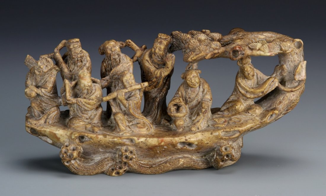 Chinese Soapstone Carving of Eight Immortals: China, 19th C., soapstone carving of eight immortals, intricately sculpted with the figures engaged in various activities, including playing musical instruments. Height 7 in., Width 3 1/2 in. Provenan