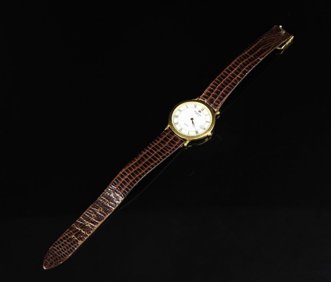 Raymond Weil Gold Watch: Raymond Weil watch, eighteen karat gold quartz. Case diameter 1 1/4 in.