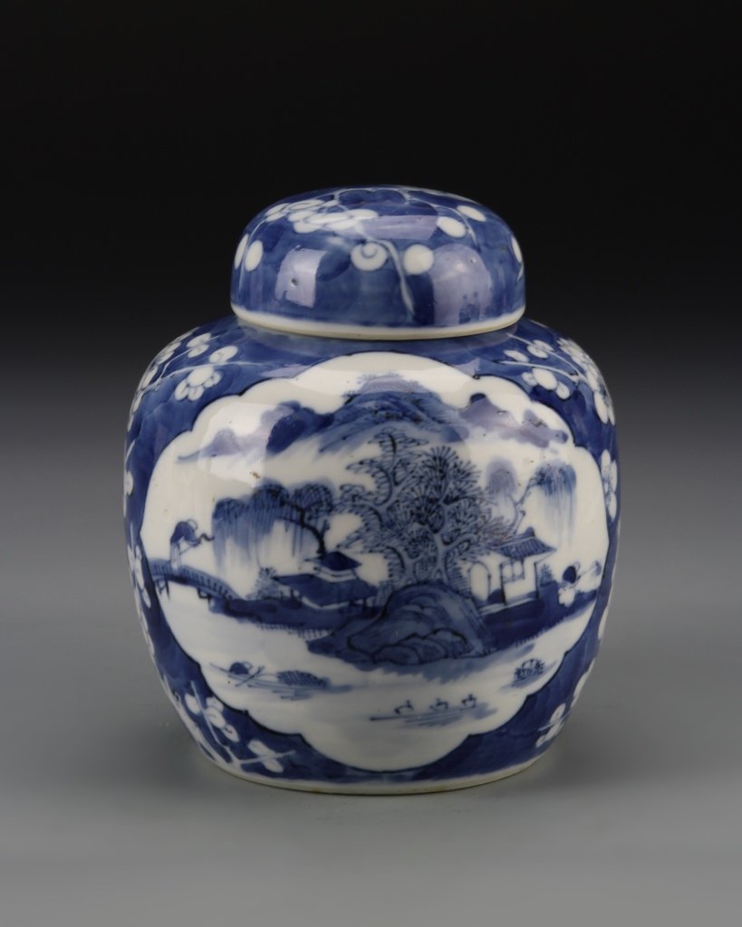 Chinese Blue and White Ginger Jar: China, 19th C., blue and white ginger jar, with rounded body and curved cover, the front with a central medallion scene of a river landscape including buildings, boats and figures, the surrounding are