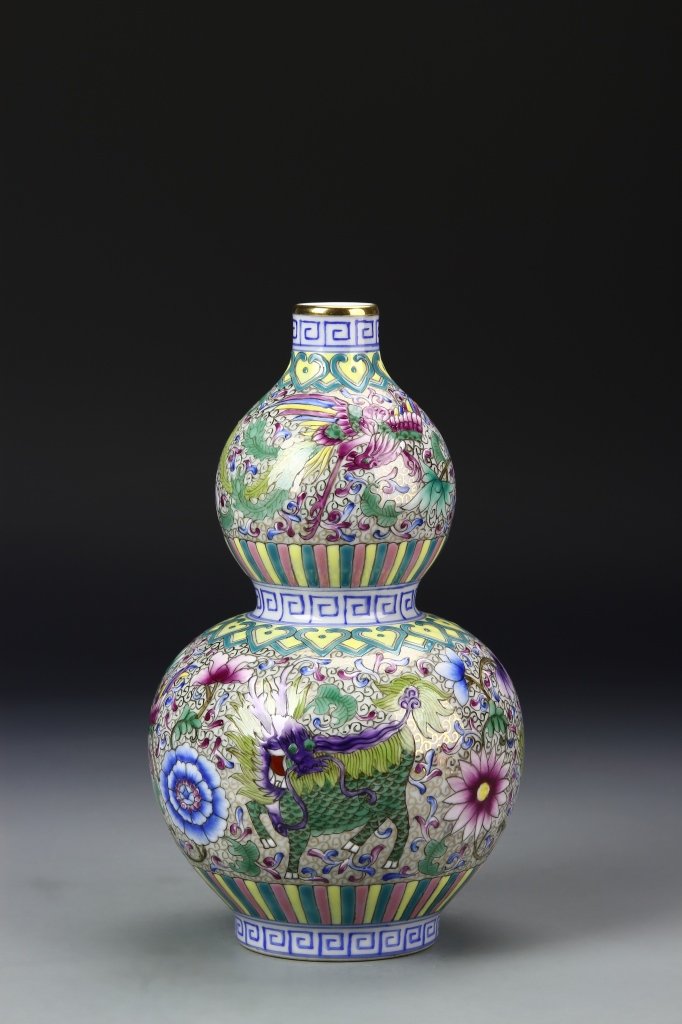 Chinese guord vase: China, Famille rose gourd vase. Qianlong mark. Height 9 in.