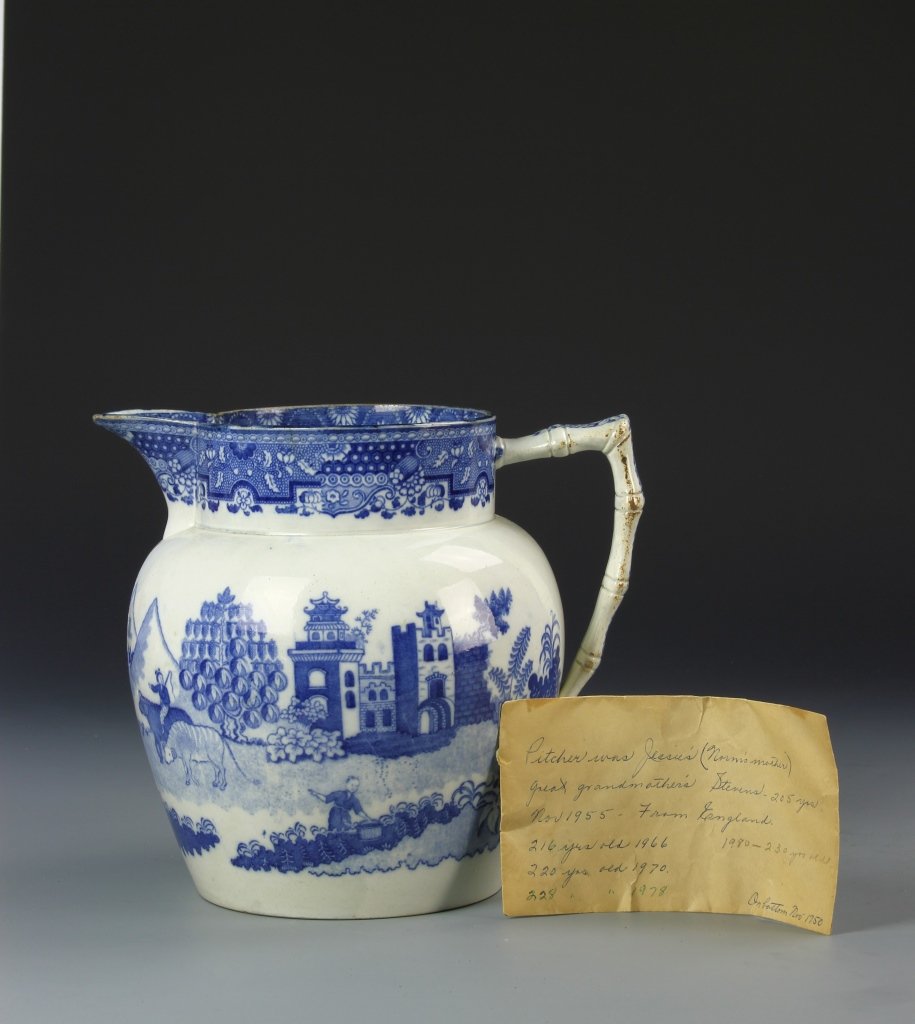 Chinese Blue and White Pitcher: China, 19th C. Blue and white Pitcher, with minor hairlines. Height 8 1/4 in .