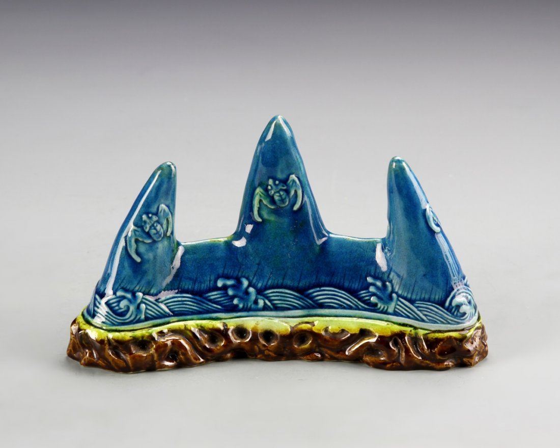 Chinese Sancai Brush Rest: China, ROC Period, Sancai brush rest, in a three point form, with a deep blue glaze, bat motifs, and a high shine surface, Qianlong mark. Width 6 5/8 in., Height 4 in.