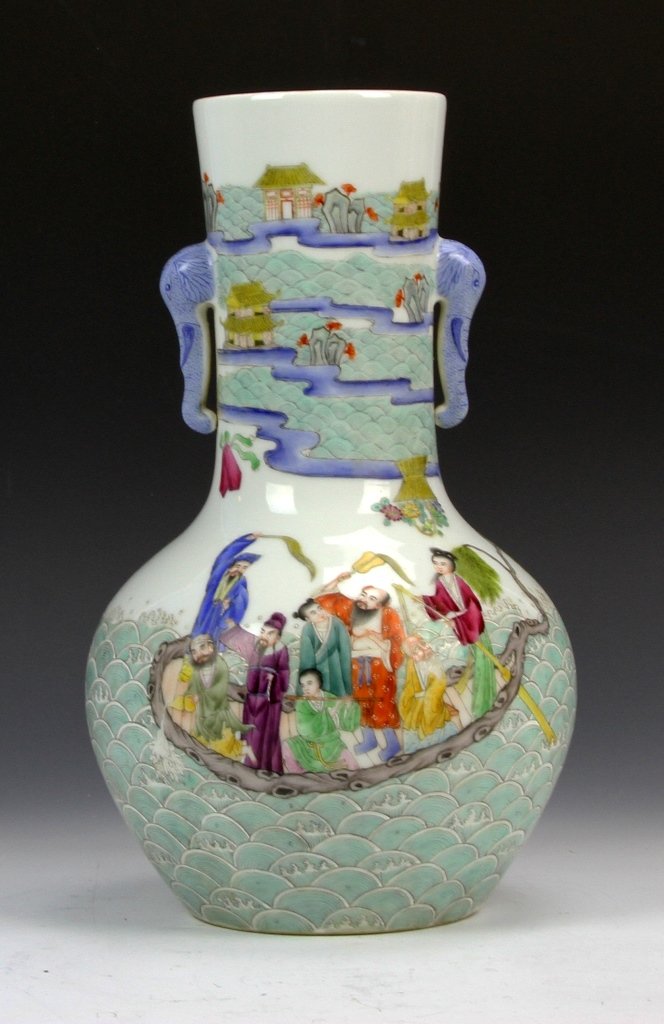 Chinese Famille Rose Vase: China, 19th C., Famille Rose vase, blue ears that are Elephant trunks, with painted images of eight immortals in a water landscape. Height 12 in., Width 7 in.