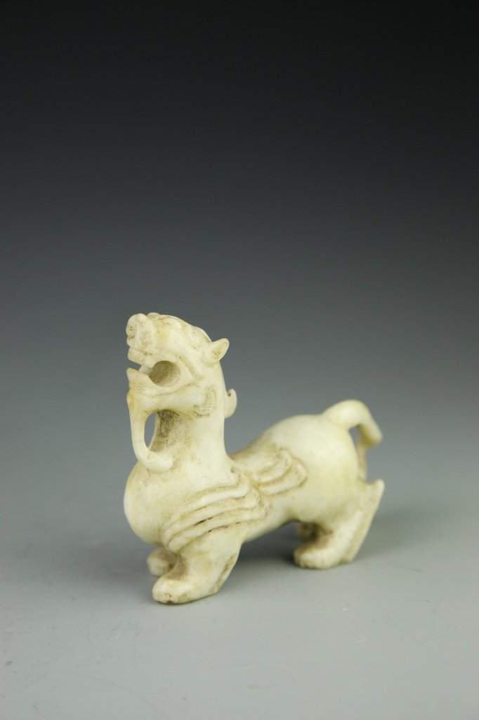 Chinese Jade Mythical Beast: China, antique jade mythical beast, missing one ear. Height 3 1/2 in.