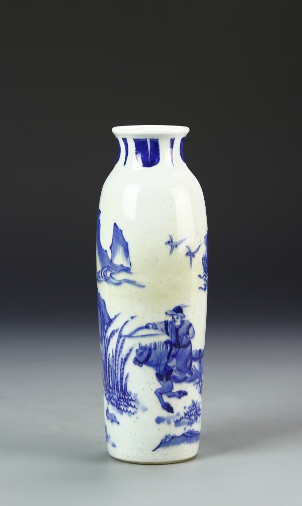 Chinese Blue and White Vase: China, Qing dynasty, blue and white vase, in baluster form, a white ground decorated with a scene of a man riding a horse in a natural landscape, with auspicious symbols around the neck. Height 9 1/2 