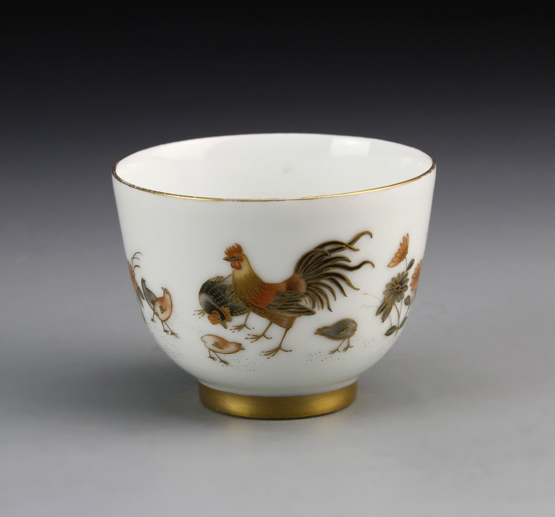 Chinese Antique Porcelain Bowl: China, antique bowl, with a gilt pedestal base, and gilt around the rim, featuring colorful rooster motifs, against a white background. Height 4 3/8 in.