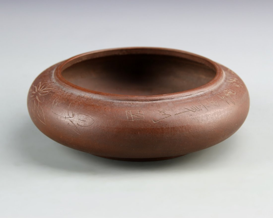 Chinese Yixing Brush Washer: China, ROC Period, Yixing brush washer, in circular form, with rounded lip, in a red-brown hue, and carved details, mark on base. Width 5 1/2 in., Height 1 7/8 in.