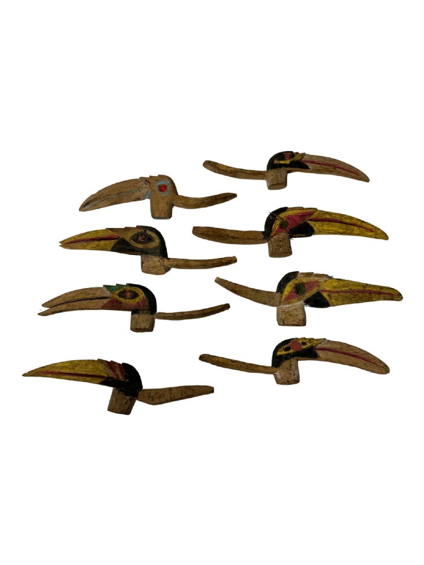 Collection of 8 carved bird cerimonial mouthpieces: 1984.01.008 Collection of 8 small carved birds held in the mouth during ceremonies while wearing Tatanua masks. Provenance: Langania Village, New Ireland island, Papua New Guinea, carved by Lagiri Pul