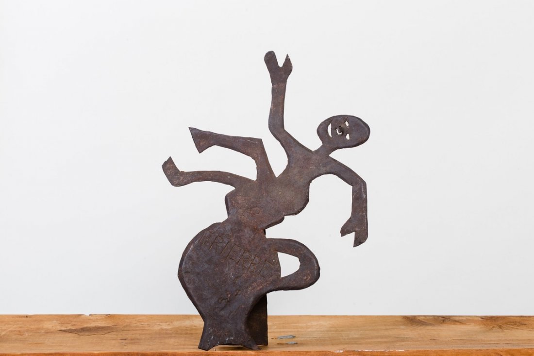 Murat Brierre (Haitian/Croix des Bouquets, 1938-1988): Murat Brierre (Haitian/Croix des Bouquets, 1938-1988) Spirit in Motion, c.1960's Sculpted recycled cut steel, 12 1/2" x 8" 3/4" x 3" Provenance Leon & Evelyn Chalom Collection Murat Brierre joined the