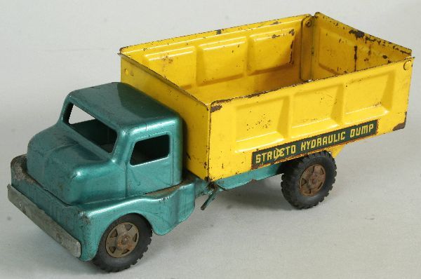 Structo Hydraulic Dump Truck: Structo Hydraulic Dump Truck. Measures 12 inches long.