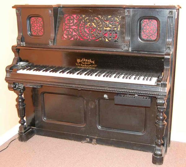 MATHUSHEK PIANO CASE WITH ELECTRIC PLAYER MECHANISM: ANTIQUE UPRIGHT CASE CA 1885 WITH NEW ALN PLAYER MECHANISM, 60"W, 24"D, 53"TALL