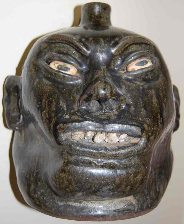 SIGNED LANIER MEADERS ROCK TOOTH FACE JUG: SIGNED LANIER MEADERS, ROCK EYES AND TEETH FACE JUG, 9"W, 8"D, 9.5"TALL