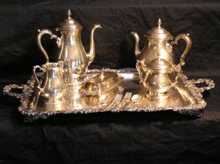Silver & Silver Plate Tea Set 394-7: Silver and silver plate tea set. The tray , butter dish, 2 spoons and 2 forks are silver plate. The two spoons and two forks have different patterns each. The 2 teapots and the sugar / creamer are mar
