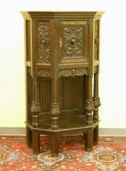 Carved Oak Cabinet with Ornate Metal Hinges