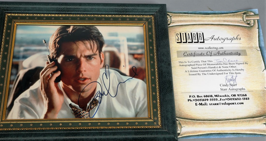 Tom Cruise Autographed Photo With COA: Photograph of Tom Cruise from a movie, signed in Sharpe with COA, from Cindy Starr of Starr Autographs. Image is 7 X 9.75 in Frame, has slipped in the frame. Should be easy to reframe. Appears in good