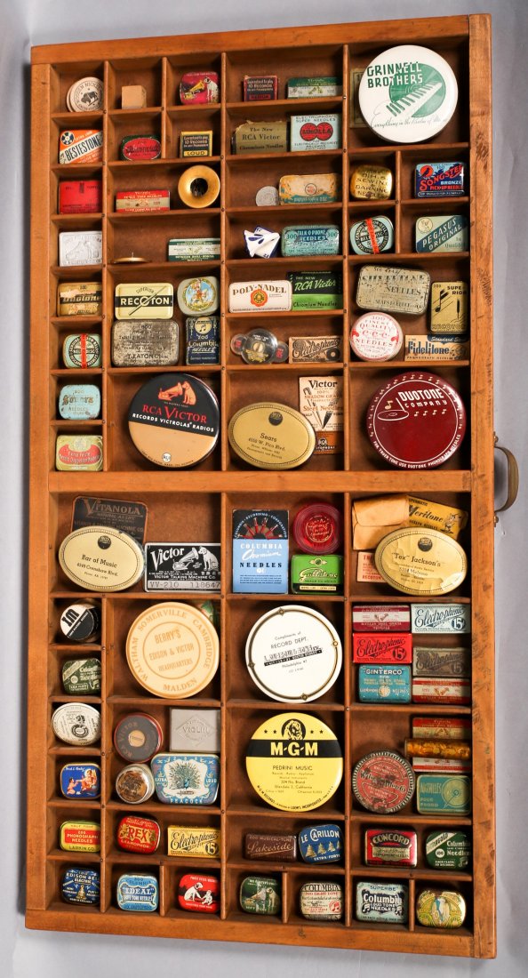 Lot of 1900-1920 Victrola & RCA Needle Cases & Shelf: Lot Of Circa 1900-1920 Victrola Needle Tins and RCA drawer turned into display case. In good overall condition. Some tins have needles some do not, Approx. 75 needle boxes. In good to very good condit