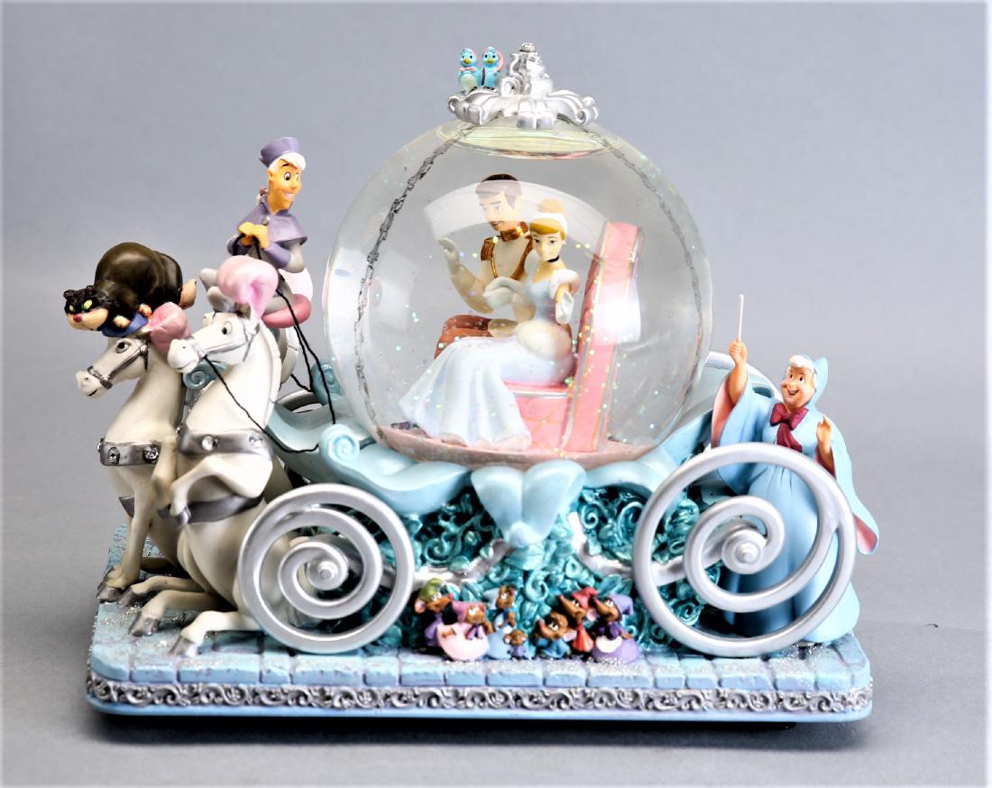 Disney's Cinderella 50th Anniversary Water Globe: Large water globe 9 inches by 5 inches by 8 inches, depicting Cinderella and Prince Charming in the carriage. Musical, plays "So this is Love"