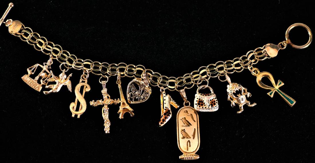 Fun 14k gold Charm Bracelet w/ 11 Charms (1 of 4)