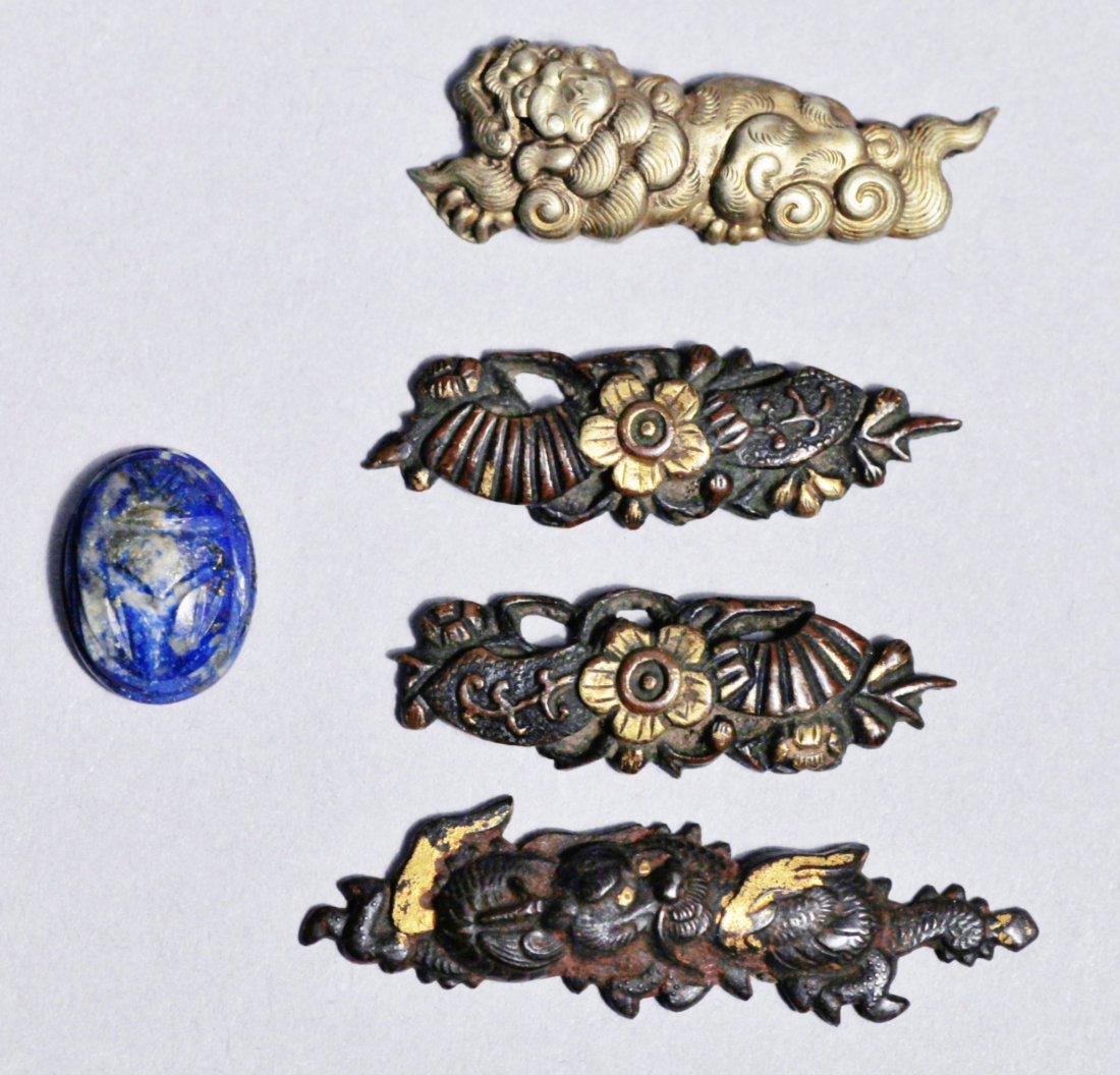 Japanese Menuki, Dragons, Floral, Signed Lapis Scarab: Great misc lot of Japanese Menuki including one pair with a gold gilt flower in the center in what appears bronze, each measuring approx 1 1/2". One bronze dragon with gold highlights, measuring appro