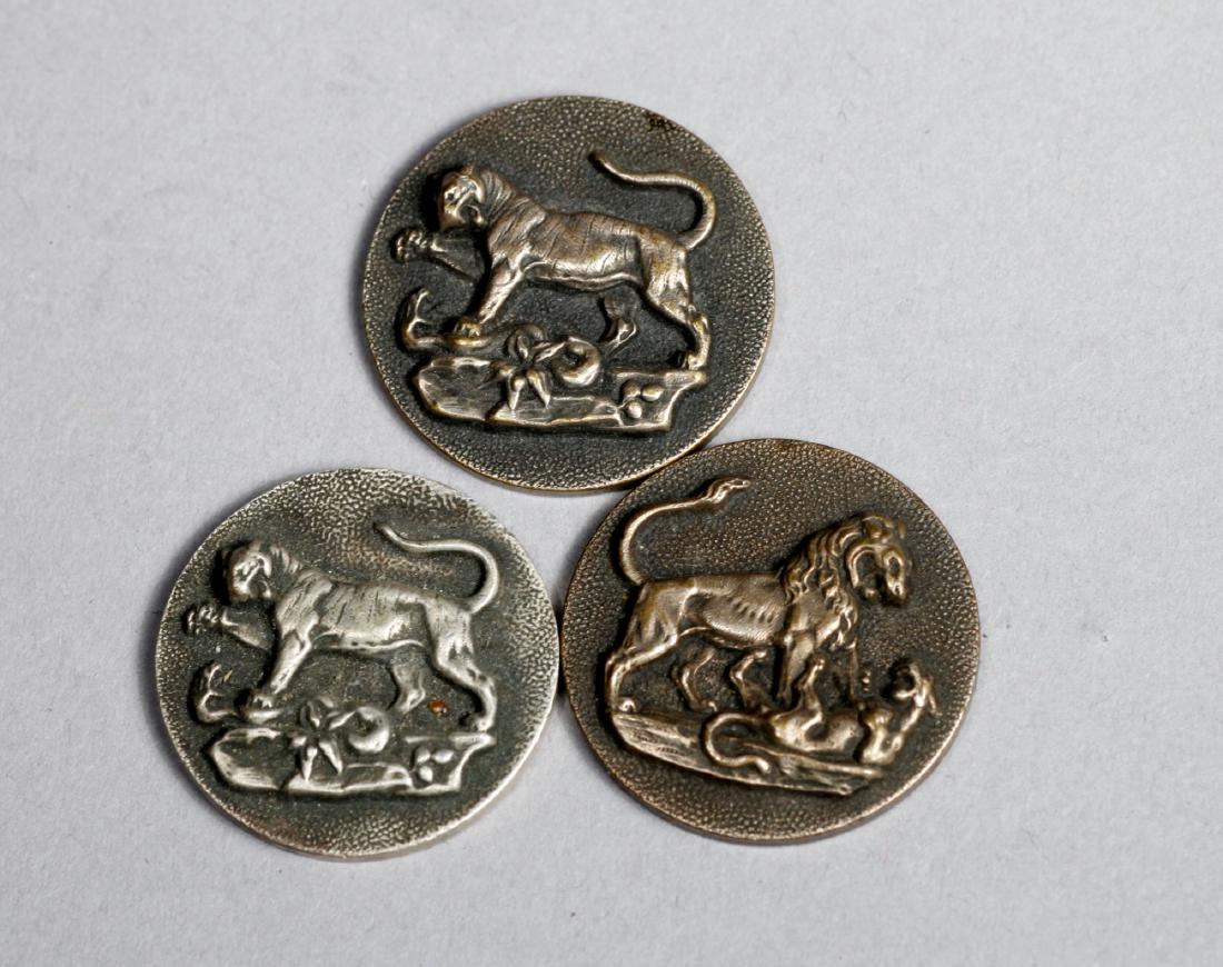 Lot of Three Antique Style Buttons TW&W Paris: Interesting lot. One of the pieces is sterling. The other two are not. The one that is sterling is around a half oz of sterling. They are marked T.W. & W on the back. Might be reproductions. Measures 