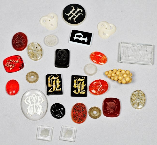 Antique Lot of Carved Intaglios: Nice lot of various sizes and shapes of gemstones, some engraved or carved, some with carved busts, 1 Elks B.P.O.E. red stone. All antique pieces. Appear to be glass.