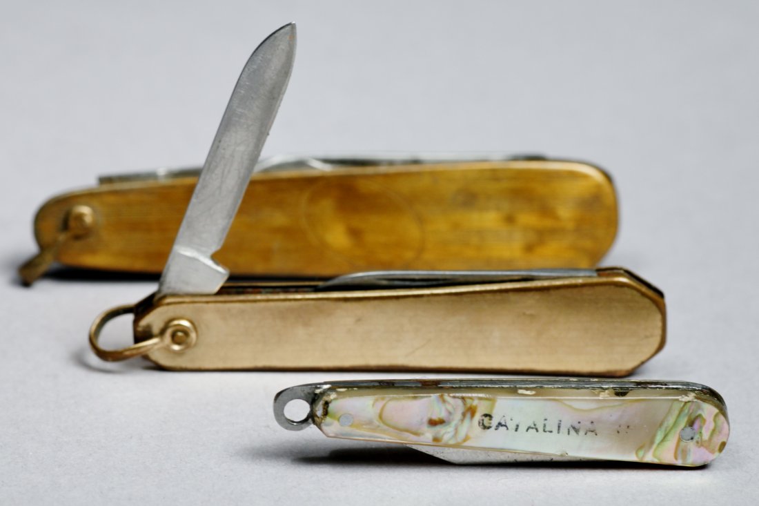 Pocket Knife Lot: Includes 3: smallest with abalone faded letter that reads Catalina, approx 1.5" in length, largest is approx. 2.75" in length. One of the knives is gold filled.