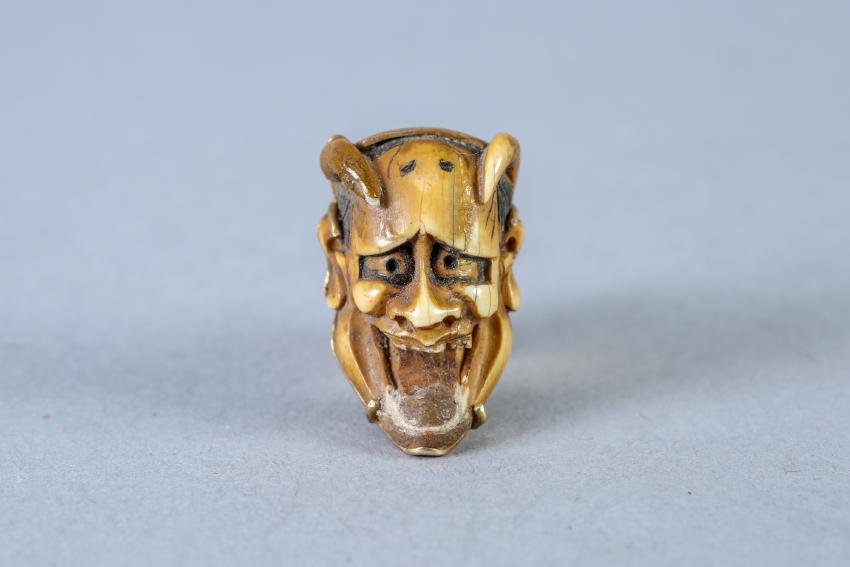 Vintage Carved Hannya Mask Cuff link: Single Vintage great detailed, Hannya Mask, carved cuff link marked 14K on back and post has a monogram. From the collection of Louis Rauch who was the head designer at "Le Petie Musee" in New York be