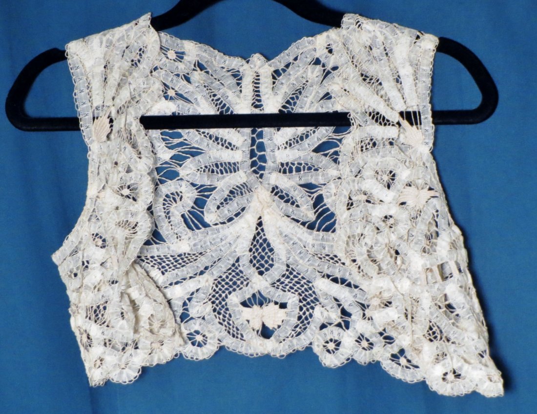 Victorian Lace Vest: Great detailed Victorian, lace, open front vest, so these are approximate measurements. Approx Measurements:Shoulder:13.5"Bust:17"Length: 11"